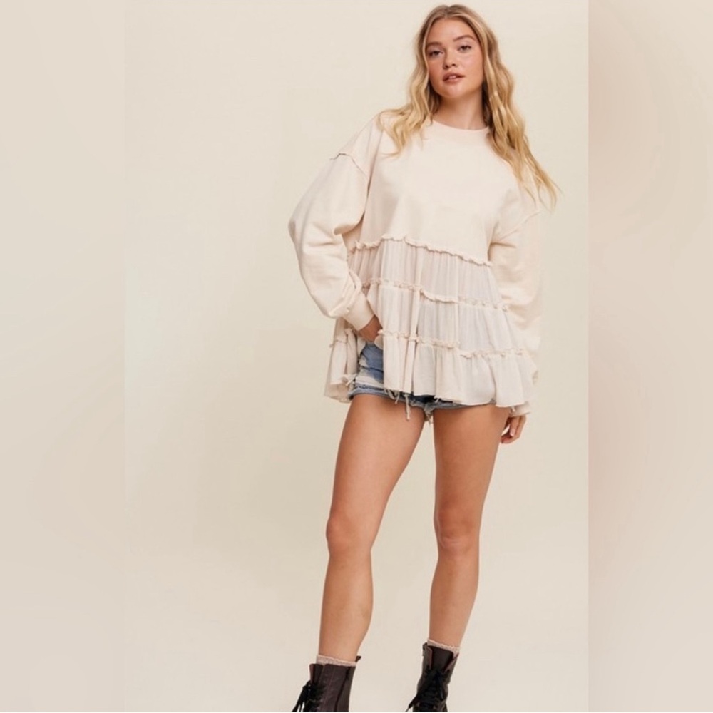 Pink Lily Ivory crew neck long sleeve ruffle tiered hem top